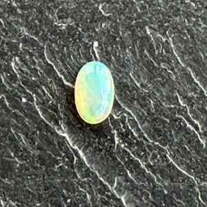 Ethiopian Opal Oval loose 9x6 Gemstone .77 carats